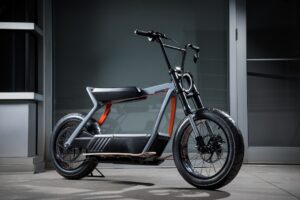 This 3D-Printed Electric Motorbike Folds Into Your Luggage — But It’s “Way Too Fast” for Most Travelers
