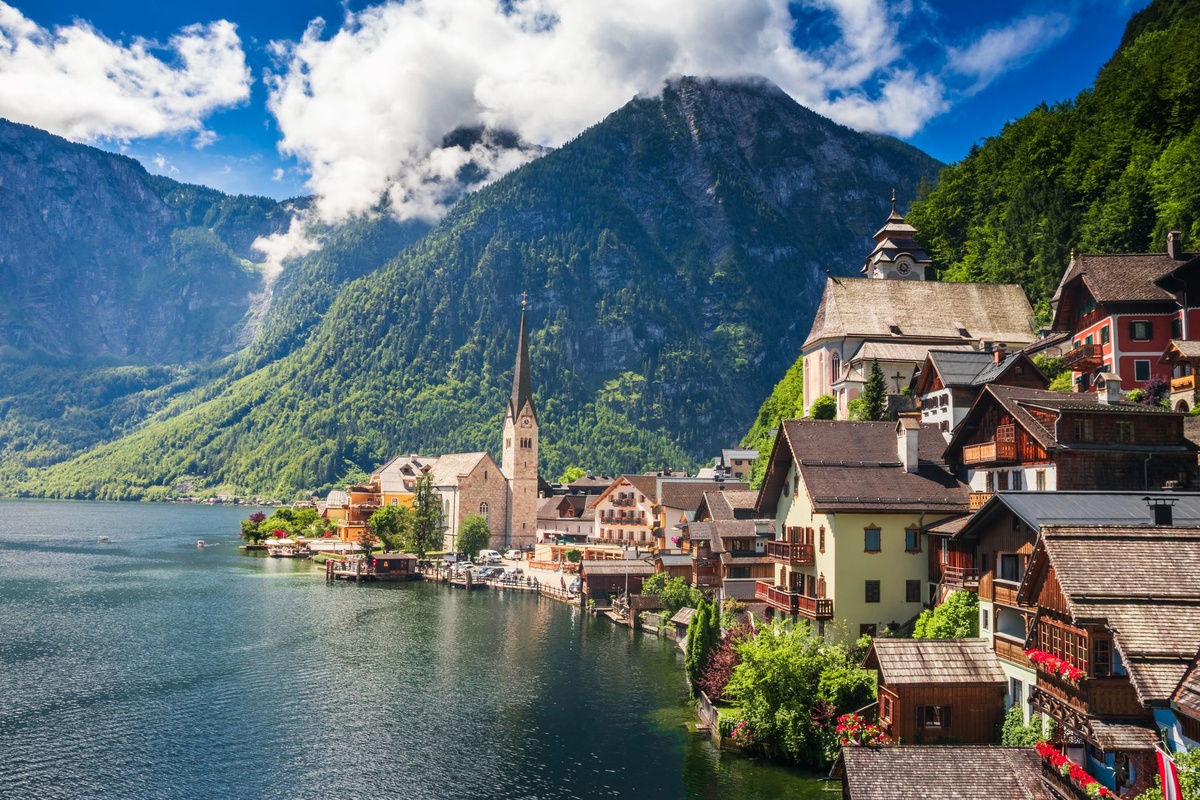 Hallstatt vs Gmunden, Lake Bled vs Lake Bohinj, and Neuschwanstein vs Hohenzollern: Comparing Lower-Impact Family Photography Alternatives by October Crowds, Train Emissions, Walking Distance, Stroller Access, and Daily Cost
